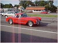 red_convertable_57ish_vette.jpg
